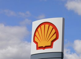 Shell logo above a filling station