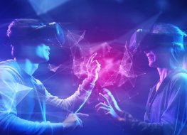 Two users enjoy the metaverse with virtual reality headsets