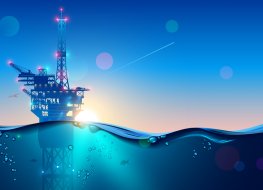 Offshore Oil or Gas Rig in sea at sunset time. industry drill platform in ocean. Water with underwater bubbles with sunrise on horizon. subsea marine landscape. Mining petroleum.