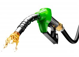 Fuel spurts out of a petrol pump nozzle