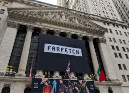 New York City - September 21, 2018: Banner on the New York Stock Exchange building celebrating the IPO of the on line fashion house Farfetch in Lower Manhattan.