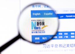 Xinhua News Agency website page with close up logo.