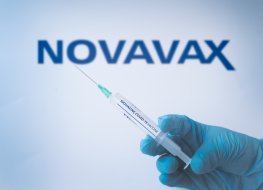 Istanbul, TR - January 29 2021: Novavax vaccine. syringe close up. covid-19 vaccination. medicine, healthcare and pandemic concept disease, medical gloves injection inject. protection.