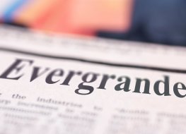 Newspaper headline reading Evergrande