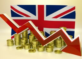 Graphic showing a Union Jack and downward finance arrow
