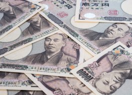 Picture of a pile of Japanese yen in 10,000-note denomination