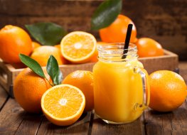 Oranges and orange juice in a glass
