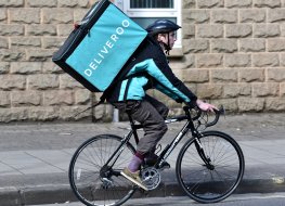 Deliveroo courier on a bicycle